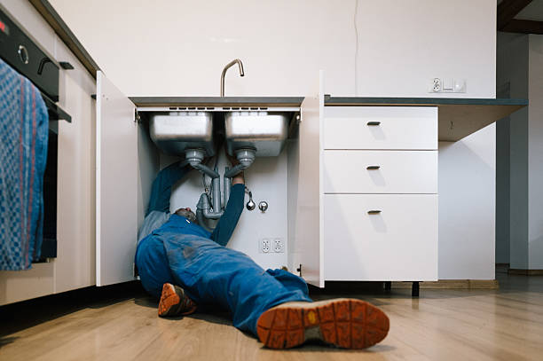 Professional Drain Cleaning technician working in Brewster, OH
